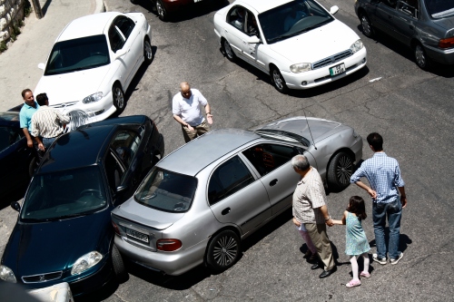 A typical scene in Amman, this one outside my window: a car accident probably caused by someone's careless driving. The man in the upper half of the picture irately yelled at the driver and my landlord for twenty minutes. I heard the Arabic word for "shit" a lot.